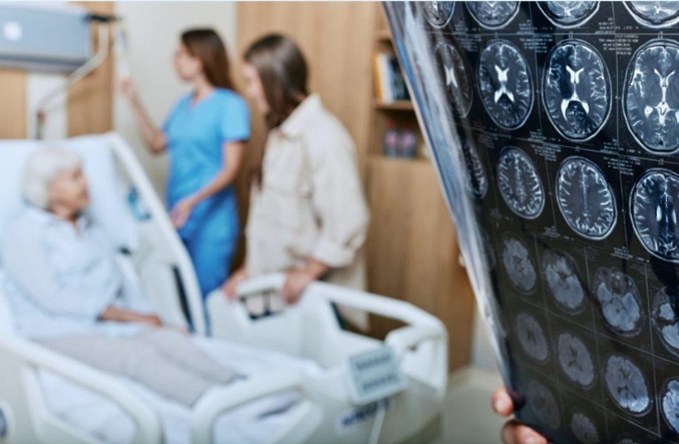 Soignantes au chevet d'une patiente